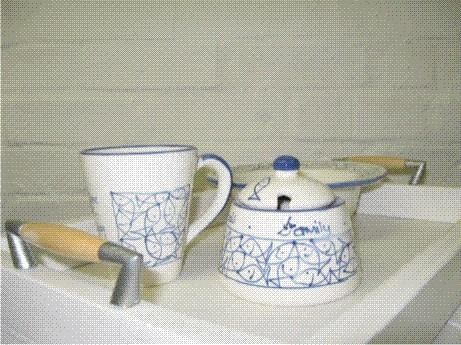 Tea tray with beach pottery