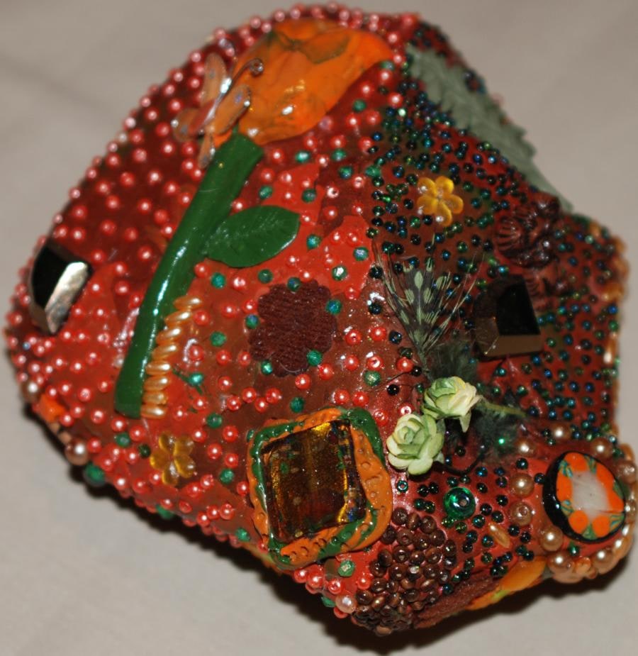 Decorated with polymer clay and losts of embelishments.