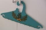 The hanger holds 17 necklaces and can also accommodate hanging earrings. Solidly made. Price: R95. Free delivery in the Johannesburg area.