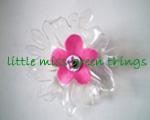 Blossoming brooch made from a recycled plastic bottle