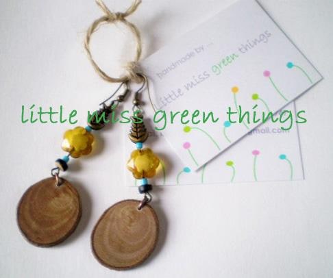 Ear Rings made from salvaged pieces of wood, combined with colourful beads.