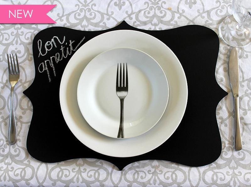 Chalkboard placemats in our french shape measuring 45 x 33 cm so a big dinner plate fits on the placemat beautifully.
We added five gray felt hearts to the back of the placemats to protect your table surface.
R80 for two!