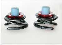 Handcrafted Candle holder. Made from hand selected horseshoes cleaned , polished and crafted to the specific craft