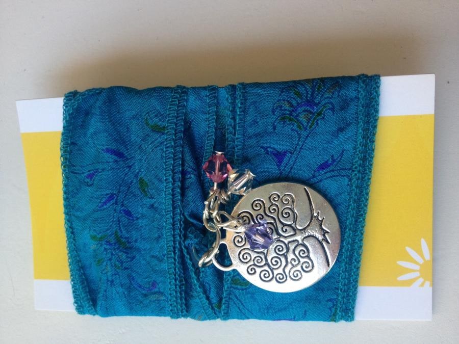 A new range of Beautiful recycled sari silk wrap bracelets with Tibetan silver boho charms and Swarovski crystals. Available in various silk wrap colours, designs and charm collections.