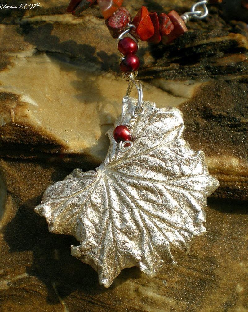Real gernium leaf painted with layers of pure silver.