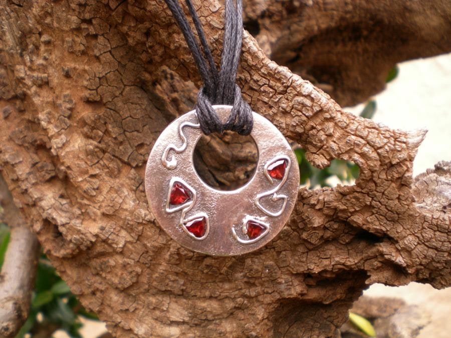 Silver Clay donut with four garnets