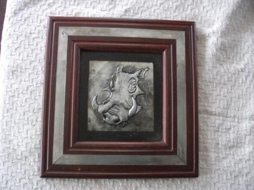 Worthog done in high relief Pewter, frame in wood and Pewter